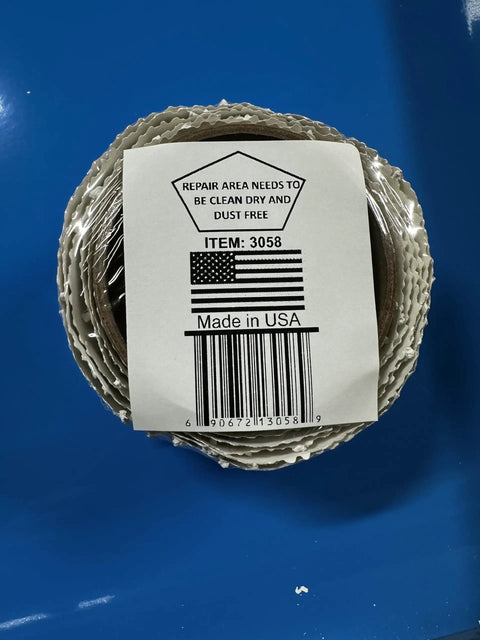 Self-Adhesive Pre-Textured Popcorn Ceiling Patch Roll with label showing Made in USA and barcode on blue background.