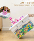 No Fuss 17 Qt Clear Plastic Storage Box With Bricks Compatible Baseplate Lid And Removable Tray For Craft Organization Beads Tools Sewing Supplies And DIY Projects, tilted with colorful blocks inside.