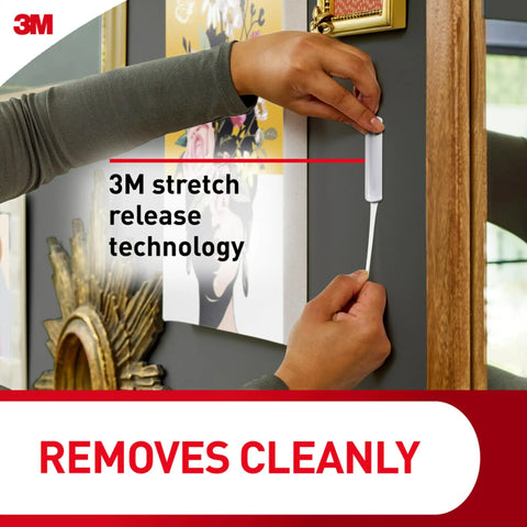 Using Hanging Made Easy With Sawtooth Picture Hangers Kit to remove strip cleanly from wall with stretch release technology.
