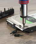Tamper Proof Torx Bit Set 13 Piece T4 To T40 Security Bits Quarter Inch Drive in use on a hard drive