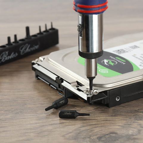Tamper Proof Torx Bit Set 13 Piece T4 To T40 Security Bits Quarter Inch Drive in use on a hard drive