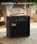 Portable 20W Bass Combo Amp With Headphone And MP3 Aux Input Practice Ready Bass Guitar Amplifier in living room setup