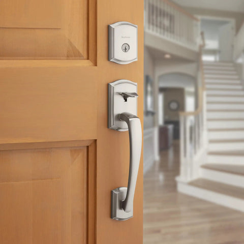 Prescott Front Door Lock Handle And Deadbolt Set With Exterior Handleset in satin nickel finish on wooden door