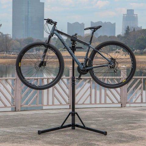 Heavy Duty Bike Repair Stand With Hand Crank Mechanical Lift, Max 110 Lbs Load, supporting mountain bike outdoors