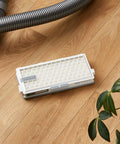 SFHA 50 Active HEPA Filter For S4 S5 S6 And S8 Vacuum Cleaners Replacement Part on wooden floor near vacuum hose