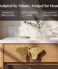 Heavy Duty Butterfly Cabinet Knobs With Slick Brushed Gold Finish For Dressers crafted from legit solid brass on a wooden drawer.