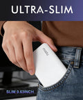 Person holding Slim Two Pack Portable Charger And 10000 Mah Power Bank For Travel sliding into a pocket, ultra-slim design 0.63 inch thick.