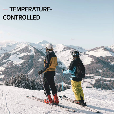 Skiers enjoying snowy mountains, wearing Merino Wool Performance Ski Socks For Men Women And Kids With Thermo Regulating Warmth