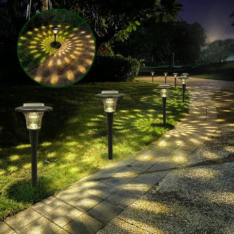 Outdoor Solar Lights For Garden And Pathway Set Of 6, illuminating path with warm white and RGB color effects at night.