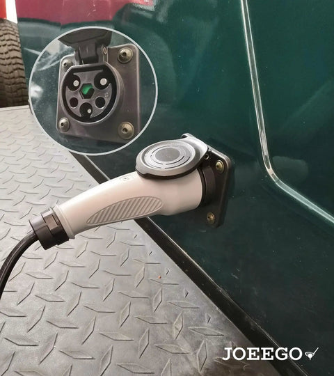 Close-up of Top Shelf Charging Power Cord Assembly For MadJax X Series Storm and Star Ev Golf Cart plugged into outlet.
