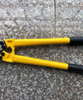 Heavy Duty 18 Inch Cable Cutters With Tapered Jaws For Stainless Steel Wire Rope Cables lying on a stone surface