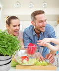 Family enjoying kitchen with Stainless Steel 4 Tier Seed Sprouting Kit With Lid, 6 Inch Diameter, Indoor Kitchen Garden Planter visible