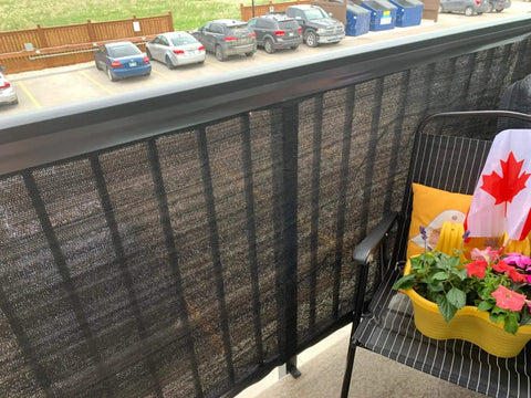 Balcony Privacy Screen Cover 3.5 Feet by 16.5 Feet Black UV Resistant Fence Screen on apartment balcony railing.
