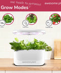 Indoor Hydroponics Garden Kit With 6 Pods, 3 Grow Modes shown with lettuce growing under adjustable light hood