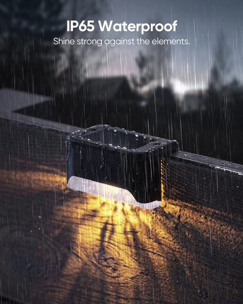 16 Pack Solar Deck Lights For Stairs And Fences Setting Those Sweet Backyard Vibes With A Dang Nice Warm White Glow Plus No Sweat Mounting And Zero Electric Bills To Level Up Your Weatherproof Yard, shown in rain.