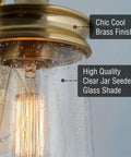 Close-up of Industrial 3 Light Vanity Light with seeded glass shade and oil rubbed bronze finish, 23 inch lantern style fixture.