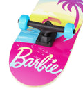 Barbie themed Kids Cruiser Skateboard With Printed Graphic Grip Tape, smooth wheels, part of durable deck and trucks in view.