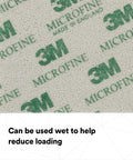 Close-up of Softback Sanding Sponge microfine grit showing foam texture for hand sanding, with brand marks visible.