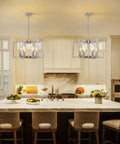 Top Tier Six Light Modern Metal Geometric Chandelier In Sleek Brushed Nickel above a kitchen island in a farmhouse style.