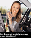 Multipurpose Pickup Tool Set With 36 Inch Flexible Claw Grabber shown retrieving keys from car interior.
