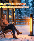Woman sitting on a wooden deck beside Grab And Go 1500W Infrared Patio Heater For Outdoor And Indoor Use, with snow outside.
