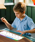 Boy using Number Line Dry Erase Boards Set With Double Sided Writable 0 To 10 On One Side And 0 To 20 On The Other Side