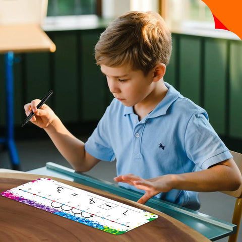 Boy using Number Line Dry Erase Boards Set With Double Sided Writable 0 To 10 On One Side And 0 To 20 On The Other Side