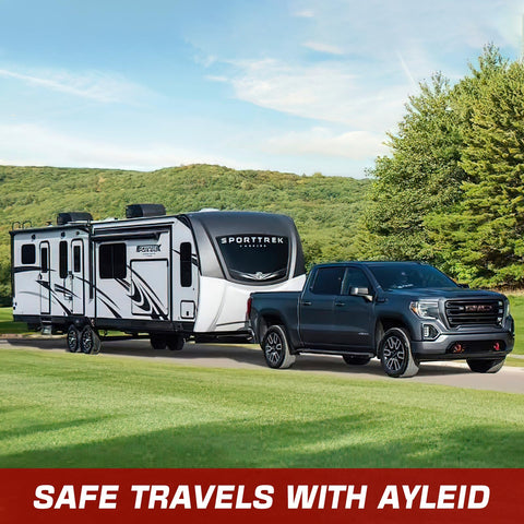 Truck towing a travel trailer through a scenic landscape with trees, promoting safe travels with Ayleid brand.