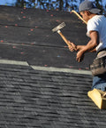 Heavy Duty Roofing Cushion With Killer Traction And Heat Blocking Kneeler Mat For Hardworking Roofer Crew used by contractor on steep roof.