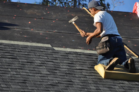 Heavy Duty Roofing Cushion With Killer Traction And Heat Blocking Kneeler Mat For Hardworking Roofer Crew used by contractor on steep roof.