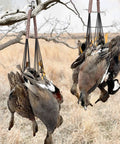 Waterfowl Tote With 12 Drops Slip Ring And Paracord hanging ducks in field, durable duck and bird carrier for hunting