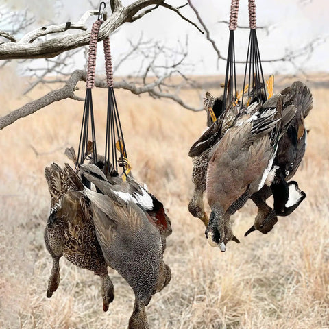 Waterfowl Tote With 12 Drops Slip Ring And Paracord hanging ducks in field, durable duck and bird carrier for hunting