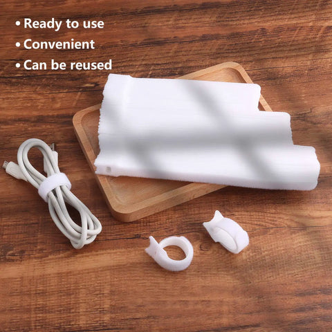 60 Pack Hook And Loop Cable Ties 6 7 8 Inch White for cable organization on a wooden surface with wrapped cable in focus