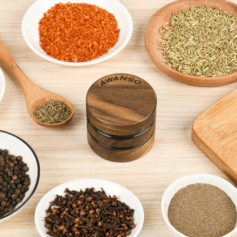 AWANSO 3-piece walnut wood and aluminum spice grinder on a wooden table