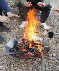 Portable 20 Inch Stainless Steel Wood Burning Fire Pit With Folding Grill And Carry Bag Ultra Compact in use at campsite