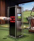 Square Golf Launch Monitor Protective Shield Case in clear acrylic on golf simulator mat indoors with club and ball.