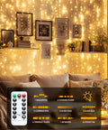 300 LED Curtain String Lights 9.8 Ft By 9.8 Ft Warm White USB Powered With 8 Modes And Remote in cozy bedroom setting