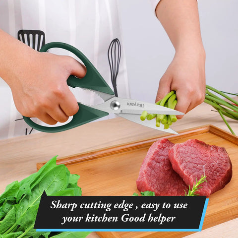 Person using All Purpose Kitchen Scissors 2 Pack Heavy Duty Meat And Poultry Shears With Comfort Grip Handles to cut herbs and meat.