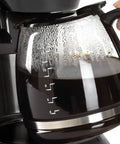 Super Convenient Programmable 12 Cup Coffee Maker With Removable Glass Carafe filled with fresh brewed coffee
