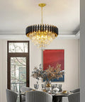 Gold 3-Light Crystal Chandelier Pendant Light For High Ceilings illuminating a modern dining area with glam decor.