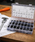 Badass Metric Socket Head Cap Screw Assortment Kit Built From Tough Carbon Steel With Hex Drives and Anti Vibration Black Coating in storage box.