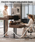 Height Adjustable Electric Standing Desk With Flip Top Hidden Storage And Handleless Drawers Featuring Motion Sensor LED Light For A Clean Workspace That Keeps Your Hustle Tight And Organized, shown in modern office setting.