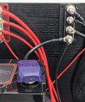 Heavy Duty 600 Amp Copper Bus Bar Power Distribution Block Featuring Nickel Plated 3/8 Terminals connected to audio wiring.