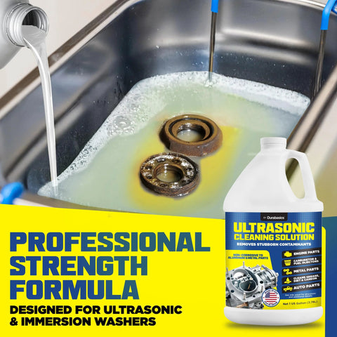 Durabasics Ultrasonic Cleaning Solution bottle with blue label; two rusted bearings soaking in an ultrasonic cleaner