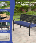 All Weather Outdoor Bench Cushion 48x18x3 Inch Navy Blue Waterproof Seat Pad on black metal bench in garden setting