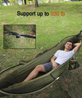 Two In One Pop Up Hammock Tent With Mosquito Net For One Person in use outdoors, showing support capacity of 330 lb