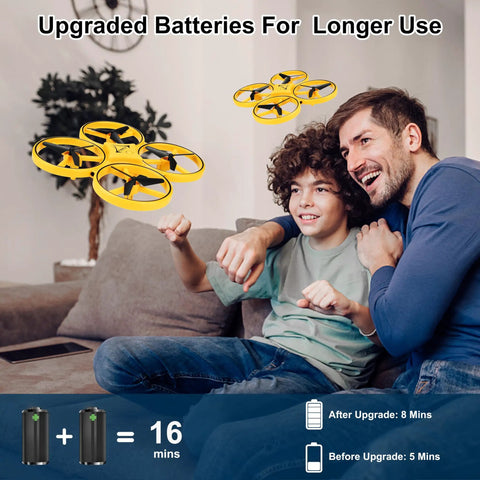 Child flying yellow Gesture Control Drone For Kids Hand Sensor RC Quadcopter With Smart Watch Control indoors with adult, extra batteries shown.