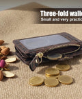 Streamlined Rfid Blocking Keychain Wallet With Genuine Leather Wrist Strap on a surface with coins and nuts, showcasing its compact design.