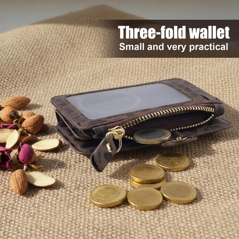Streamlined Rfid Blocking Keychain Wallet With Genuine Leather Wrist Strap on a surface with coins and nuts, showcasing its compact design.
