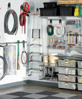 16 Pack Garage Hooks Set Durable Wall Mount Storage System With Heavy Duty Industrial Hangers For Bikes Tools Ladders Mops And Brooms Extension Straps 100 Lbs Capacity Orange installed holding various items in a garage setting.